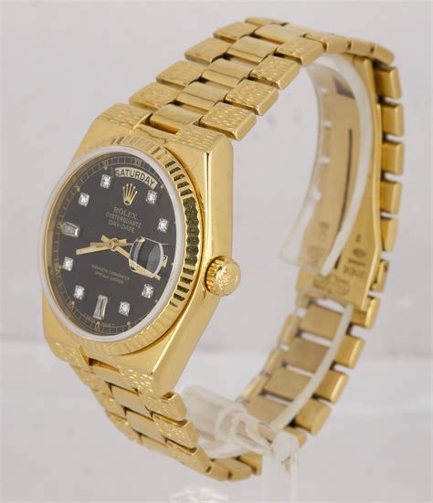 rolex day date oyster quartz.